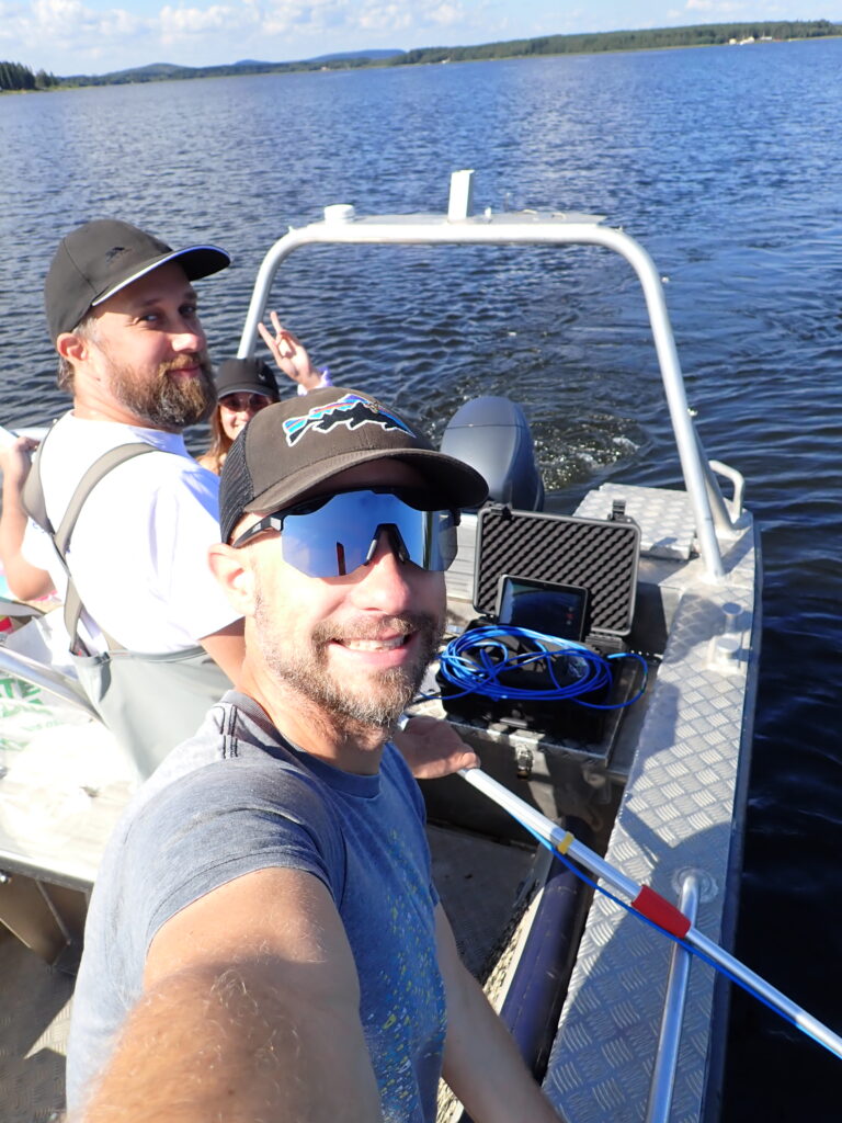 Three people on a boat