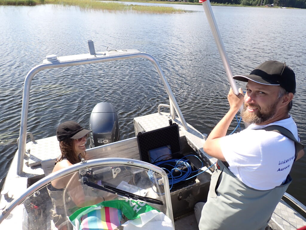 Two persons onboard a boat